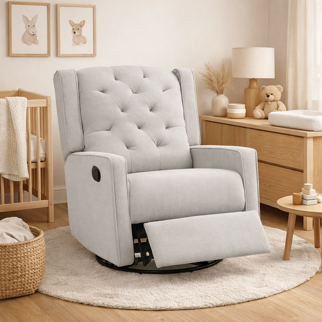 Gray recliner chair in a nursery setting with wooden furniture and decor.
